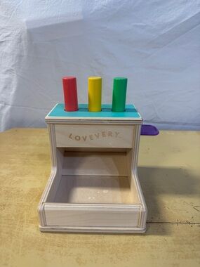 Lovevery Wooden Pop-Up Toy with Red, Yellow & Green Pegs